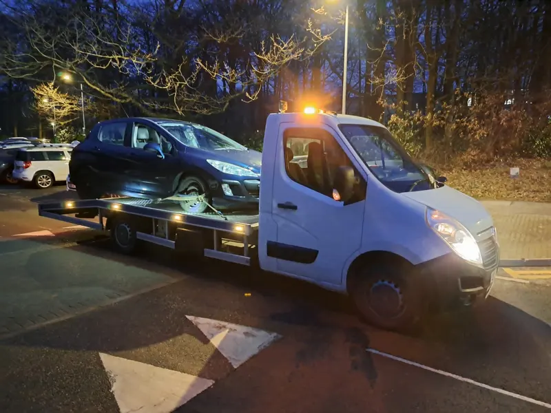 Non-running car collected in the evening near Lancaster